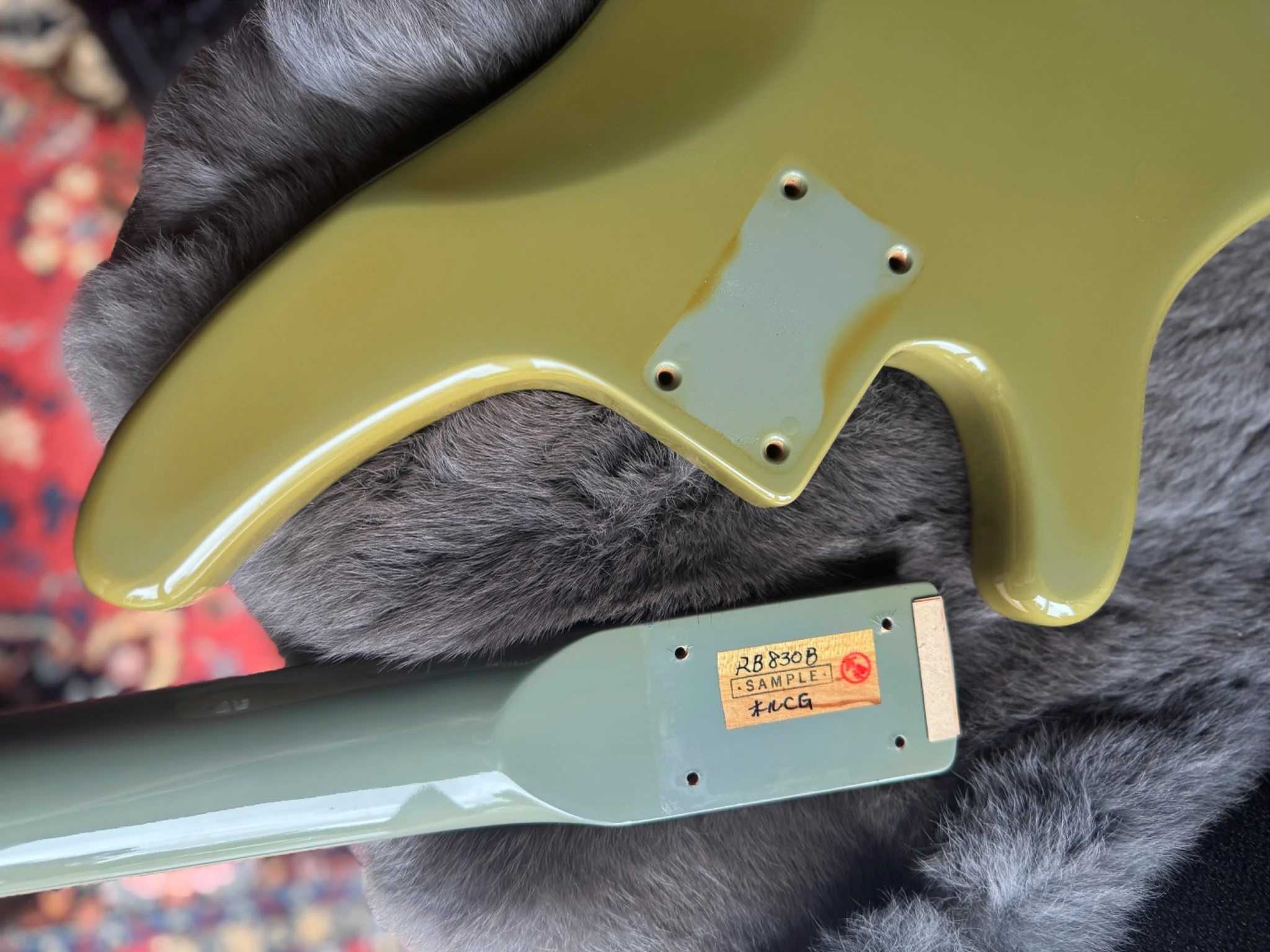 Sample label and handwritten notes inside a bass